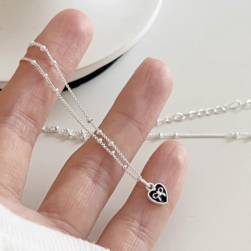 قلادة قلب حب من الفضة الإسترلي - مراجعة Tie Clip Silver وسعره